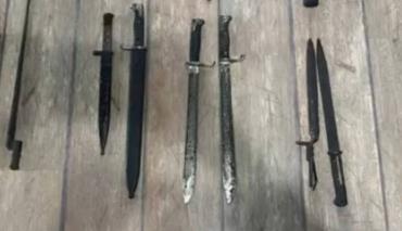 В Гродненской области изъяли оружие и знаки с запрещенной символикой 